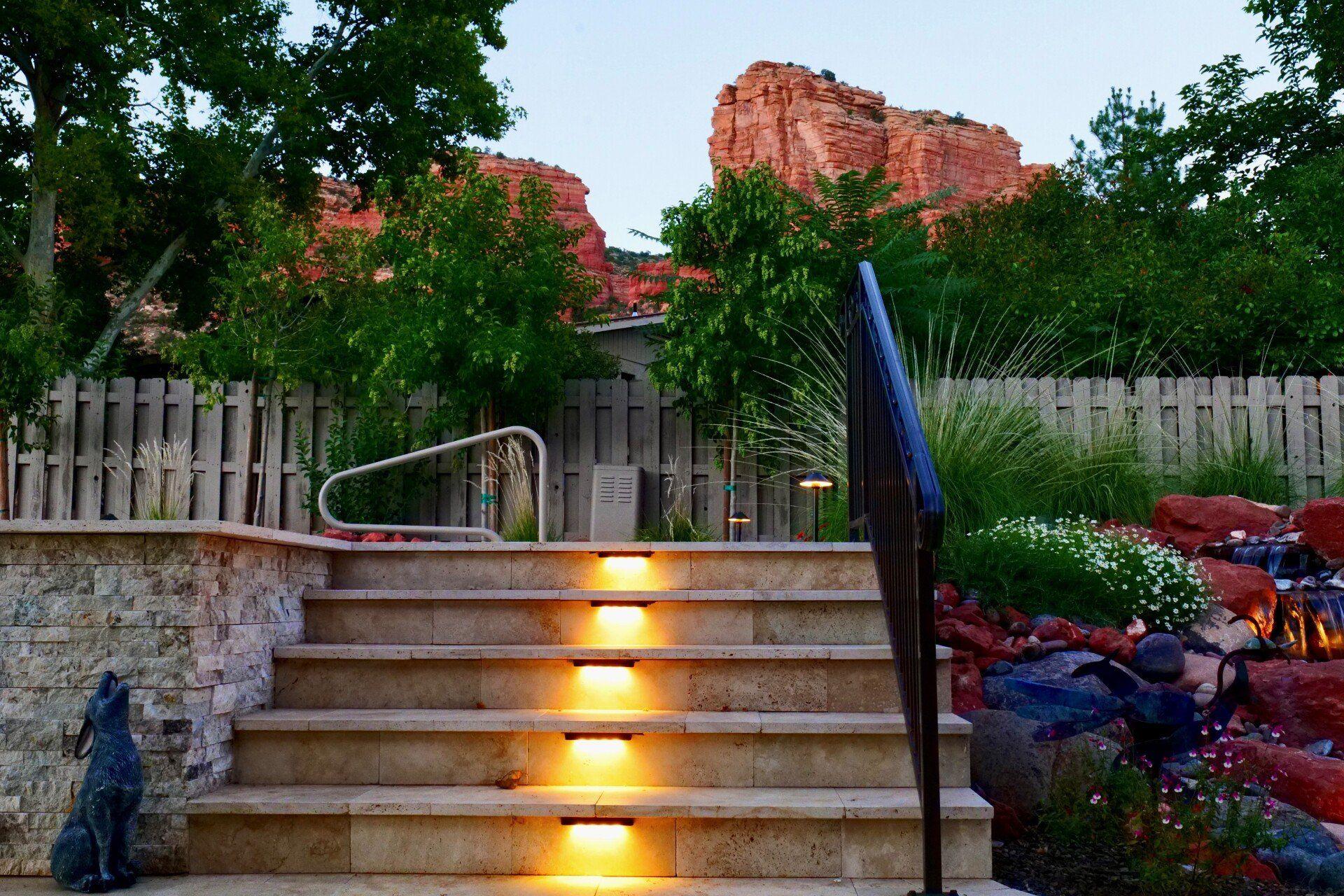 Lit stone steps between planting beds in Sedona