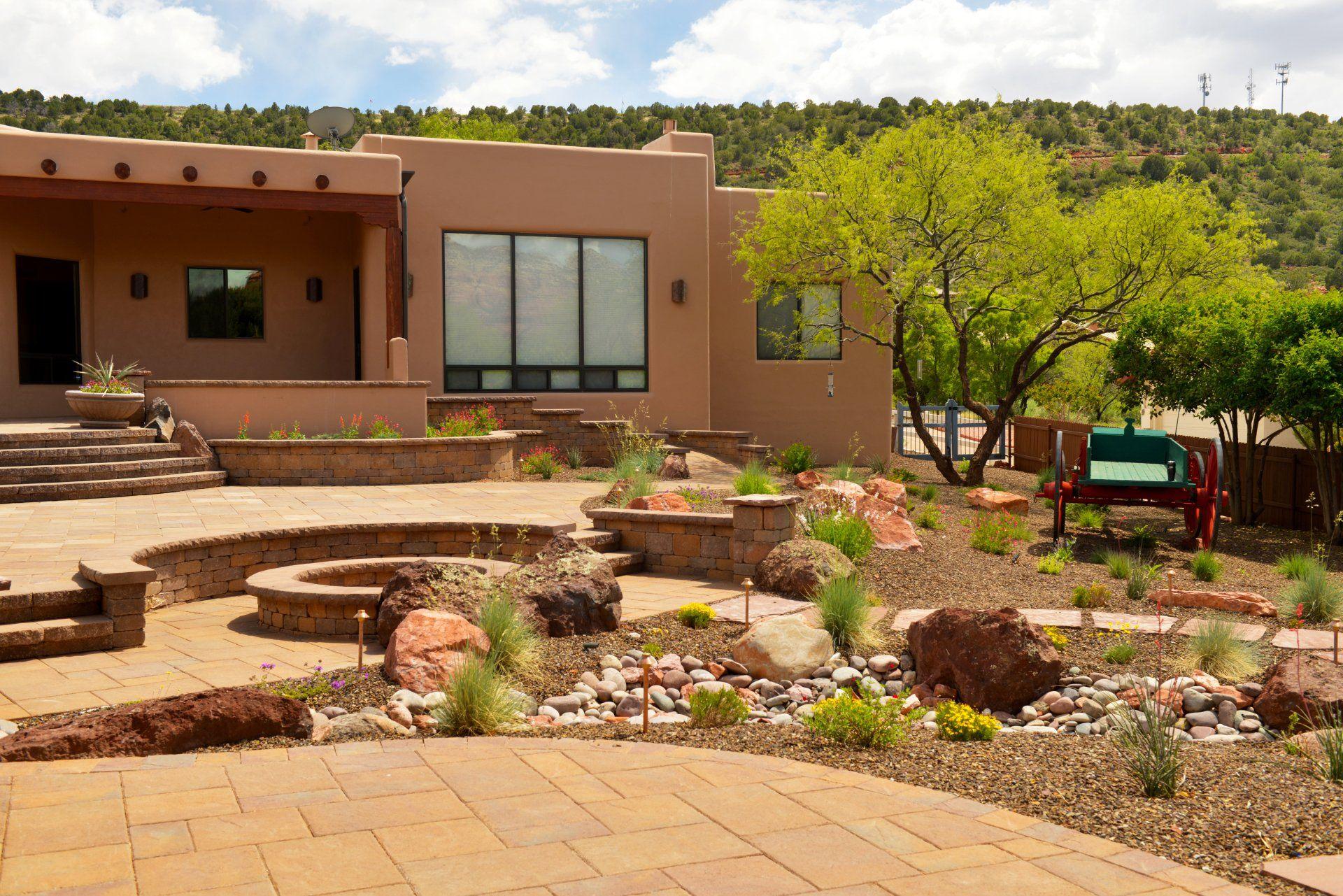 A large house with a patio in front of it